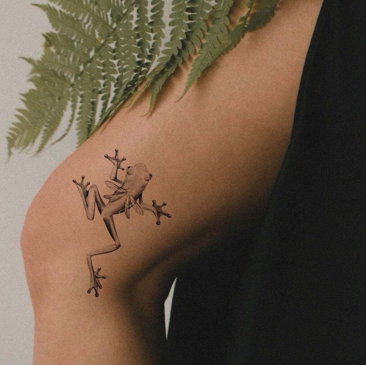 diseño de tatuaje rana en la pierna en medellin