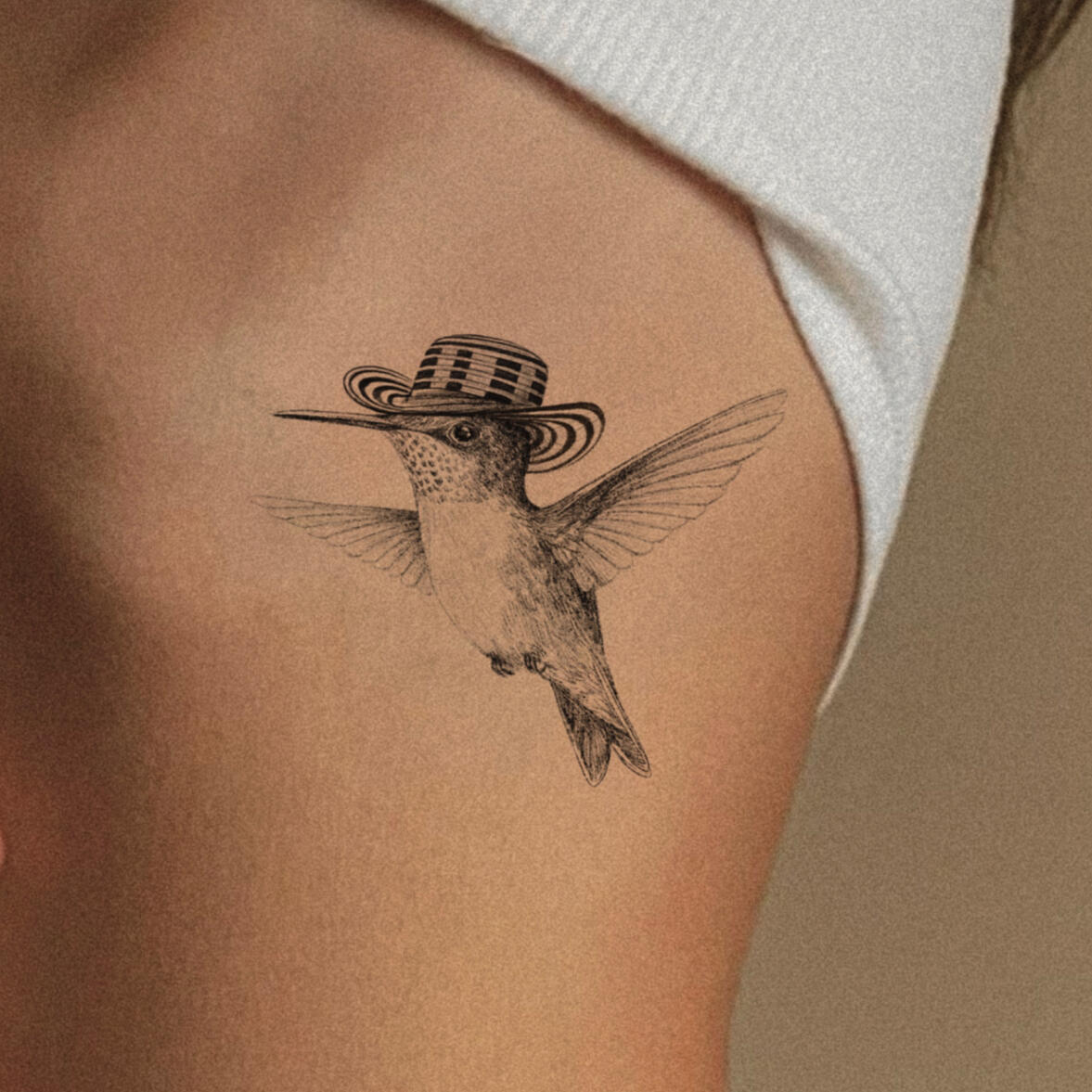 diseño de tatuaje colibri en las costillas medellin